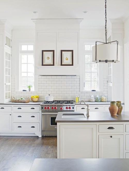 Some beautiful kitchens featuring subway tiles.