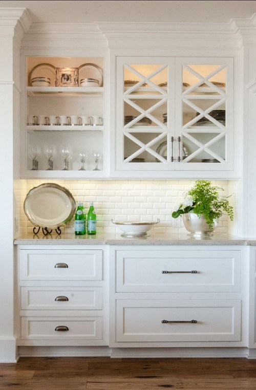 Some beautiful kitchens featuring subway tiles.