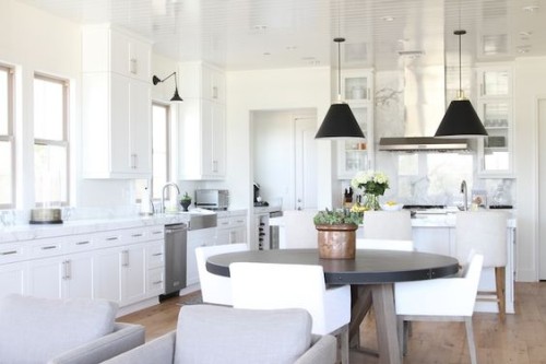 Open plan kitchen and dining area with round table. Friday's Favourites, Gallerie B.