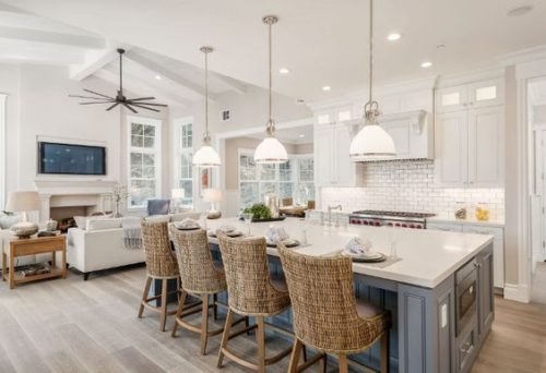 Open plan Hamptons style kitchen and living room.