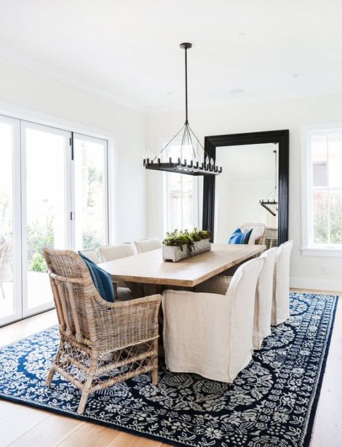 Homely dining room with slipcover chairs and rattan carvers. Friday's Favourites.