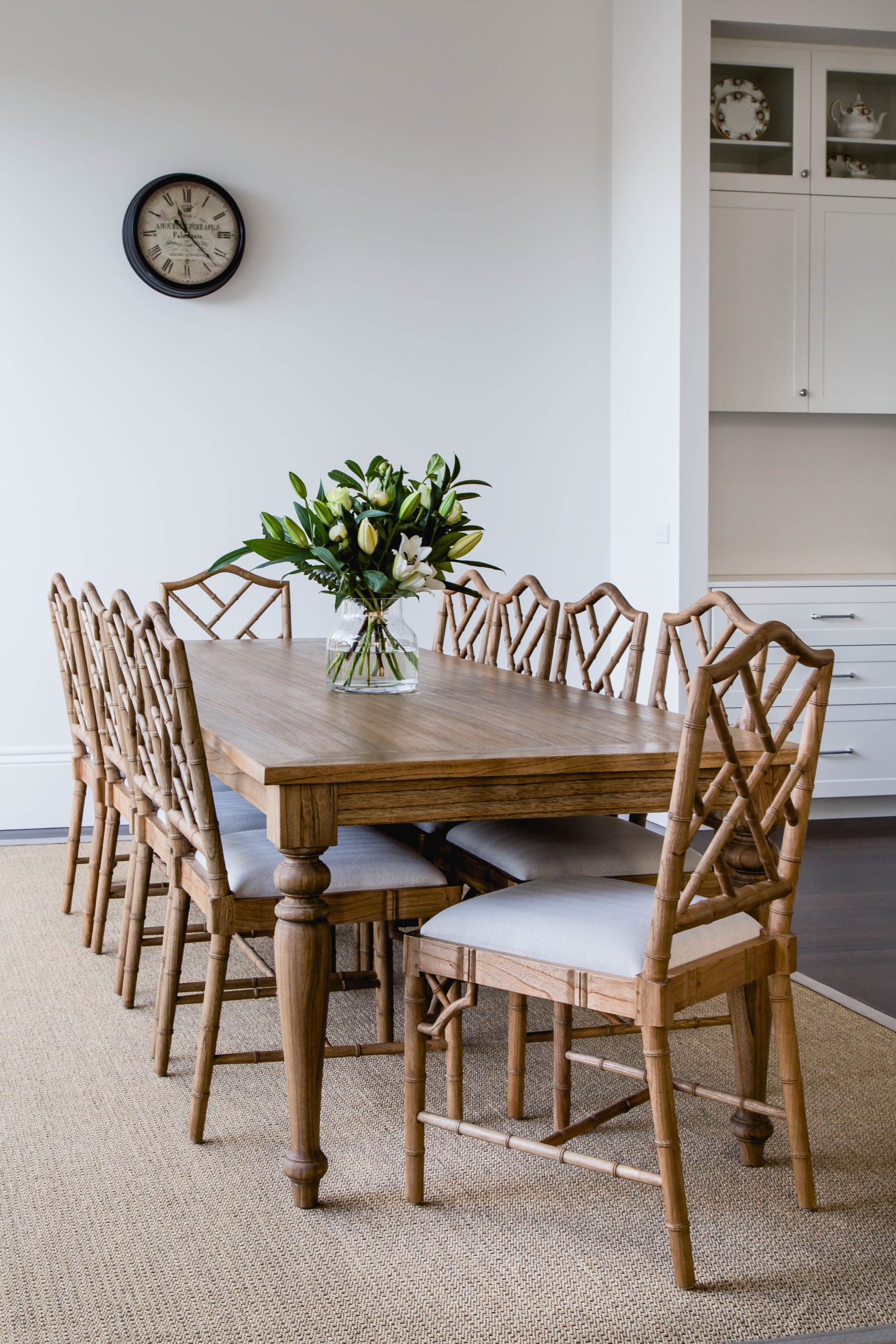 The oak dining table and Chippendale chairs.