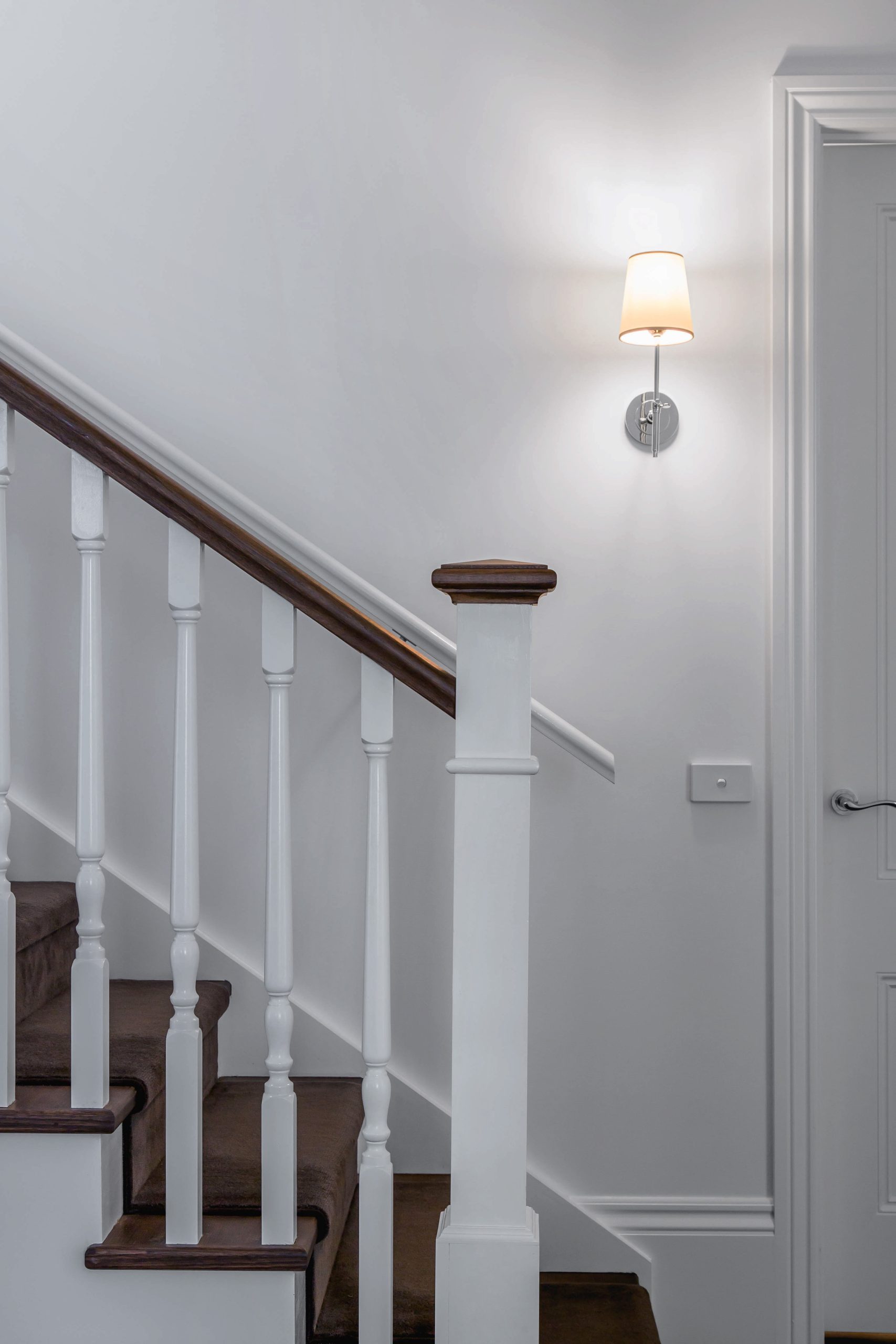 Wall lights in staircase.